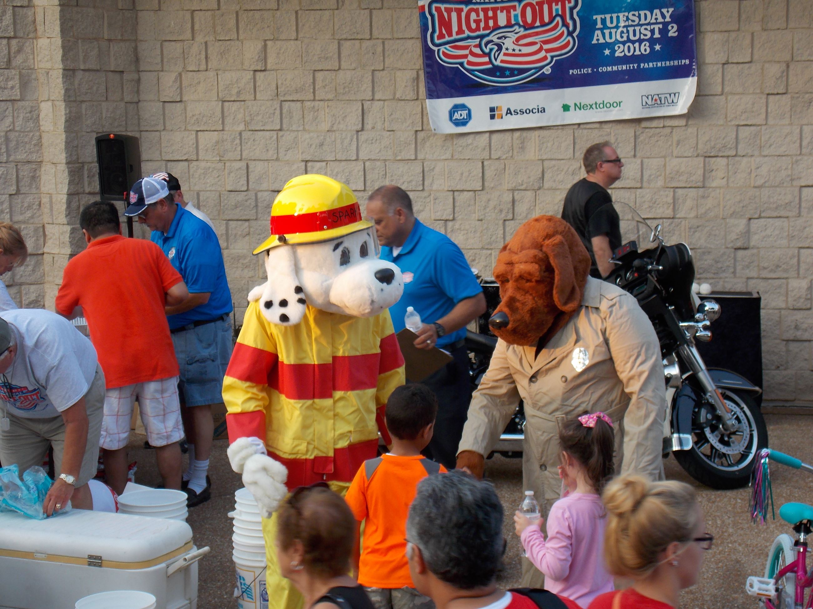 Sparky and McGruff with Children at National Night Out